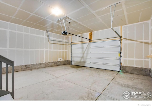 garage featuring a garage door opener