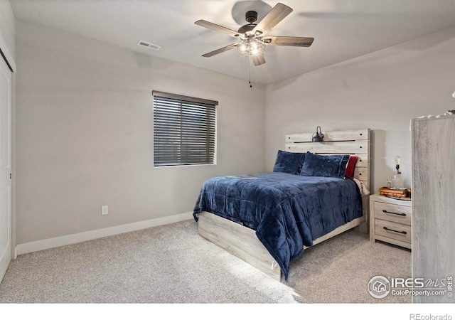 carpeted bedroom featuring ceiling fan