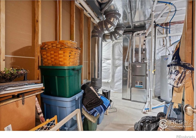 interior space with electric water heater and heating unit