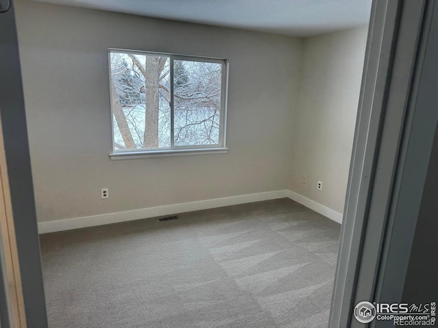 view of carpeted empty room