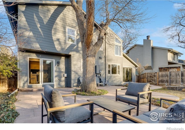 rear view of property with a patio