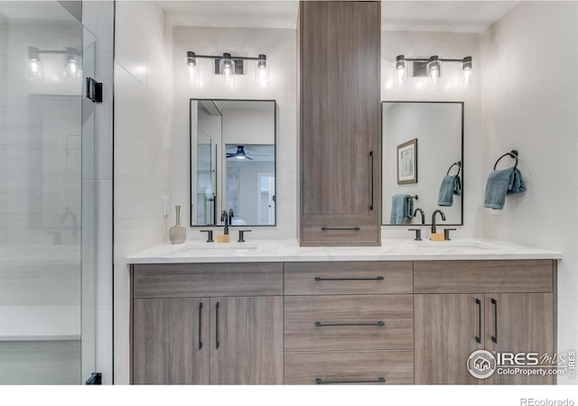 bathroom with vanity and walk in shower