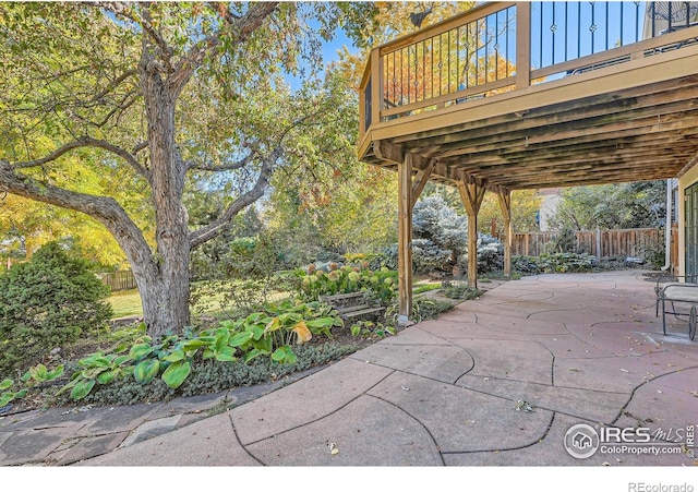 view of patio / terrace featuring a wooden deck