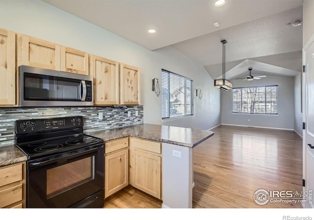 kitchen featuring lofted ceiling, light hardwood / wood-style flooring, kitchen peninsula, black range with electric stovetop, and decorative backsplash