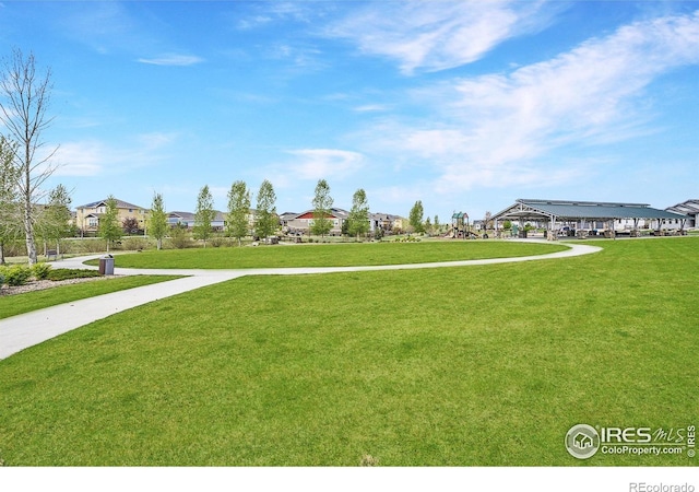 surrounding community with a lawn