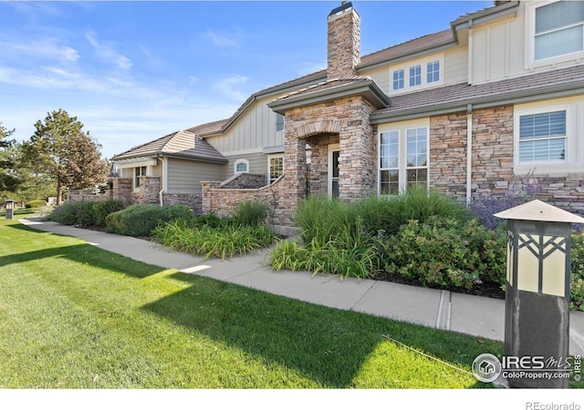 view of front of home with a front yard