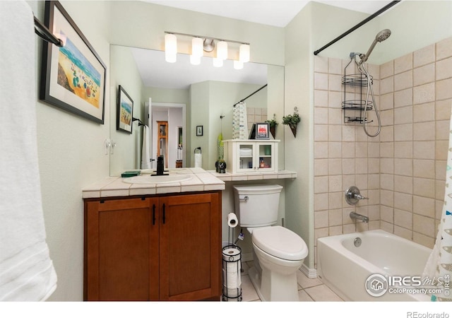 full bathroom with vanity, tile patterned flooring, toilet, and shower / bath combo with shower curtain