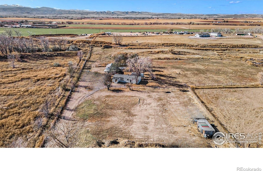 bird's eye view with a rural view and a mountain view