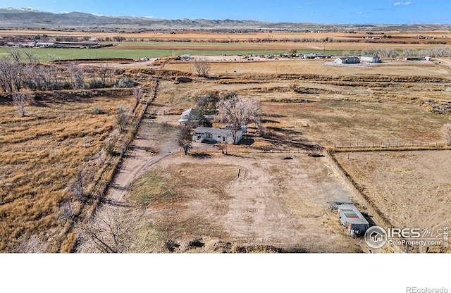 bird's eye view with a rural view and a mountain view