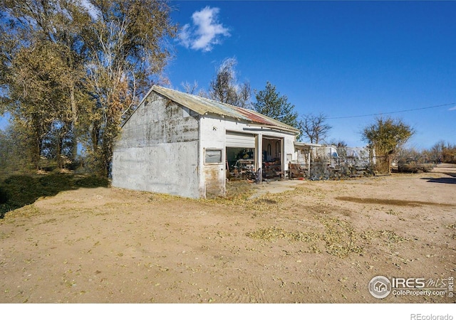 view of outbuilding with a garage