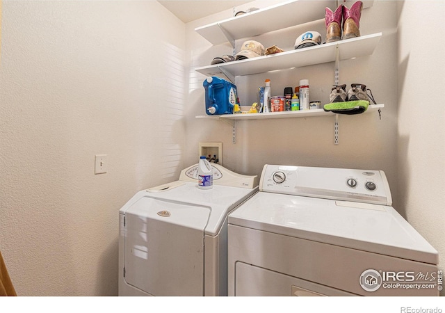 laundry area with independent washer and dryer