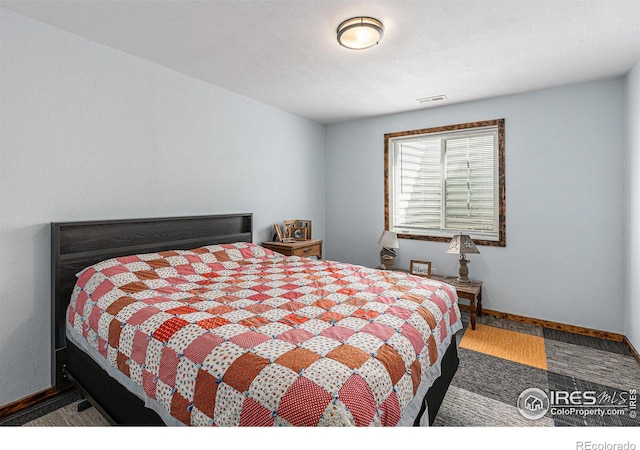 bedroom with a textured ceiling