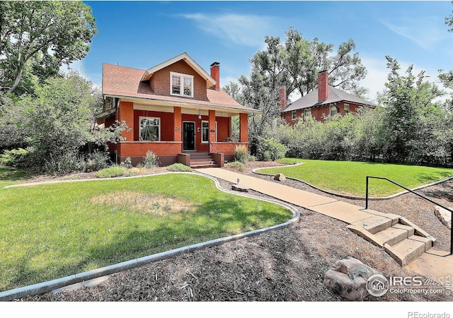 craftsman house featuring a front yard and a porch