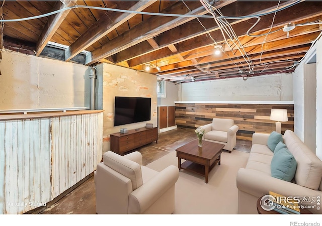 living room featuring concrete floors