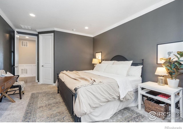 bedroom featuring crown molding and carpet flooring