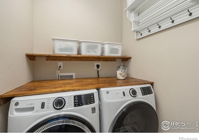 laundry area featuring independent washer and dryer