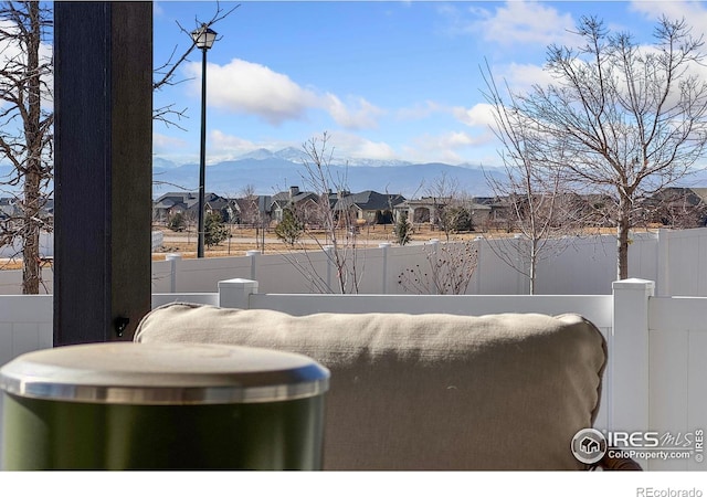 view of patio / terrace featuring a mountain view