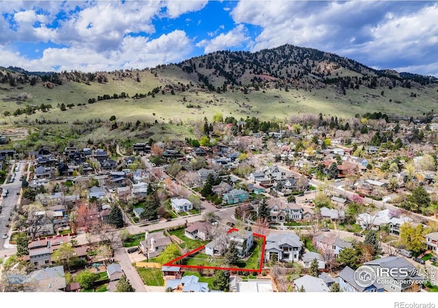 property view of mountains featuring a residential view