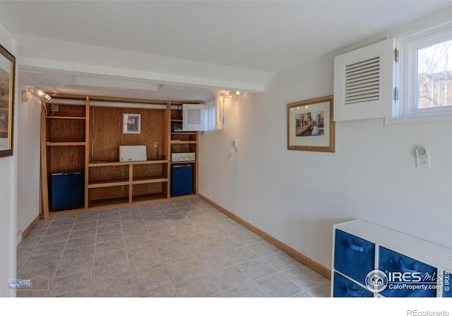 interior space with baseboards