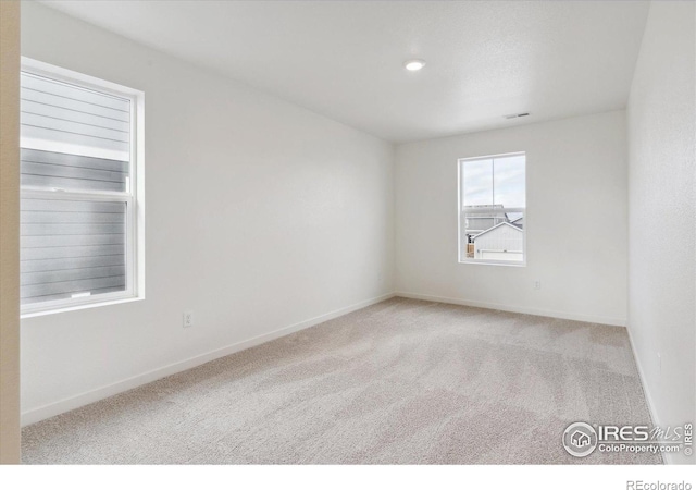 view of carpeted spare room