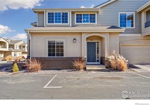 view of front of property featuring a garage