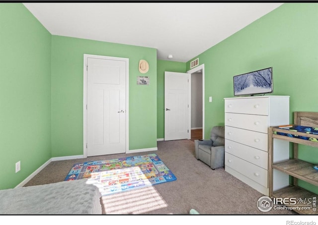 bedroom featuring carpet flooring