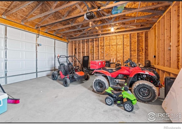 garage featuring a garage door opener