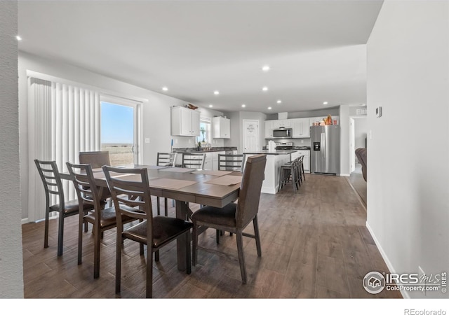 dining room featuring dark hardwood / wood-style floors