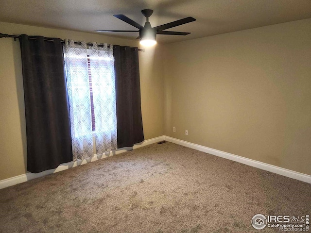 2023 81st Ave, Greeley, CO 80634 - spare room with a ceiling fan and carpet flooring