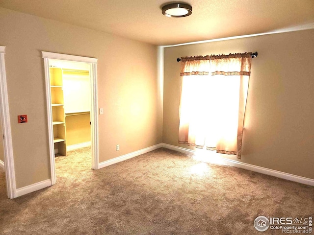 2023 81st Ave, Greeley, CO 80634 - empty room featuring carpet floors and baseboards