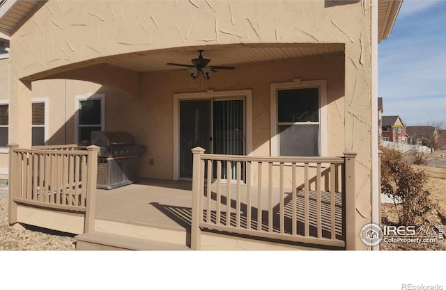 2023 81st Ave, Greeley, CO 80634 - deck with grilling area and ceiling fan
