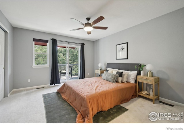 carpeted bedroom featuring access to outside and ceiling fan