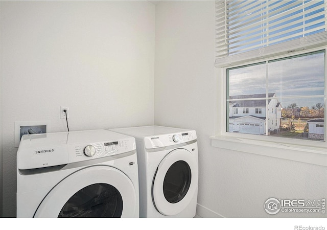 laundry area featuring washing machine and dryer