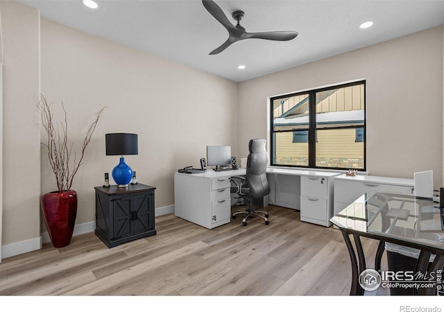 office area with ceiling fan and light wood-type flooring