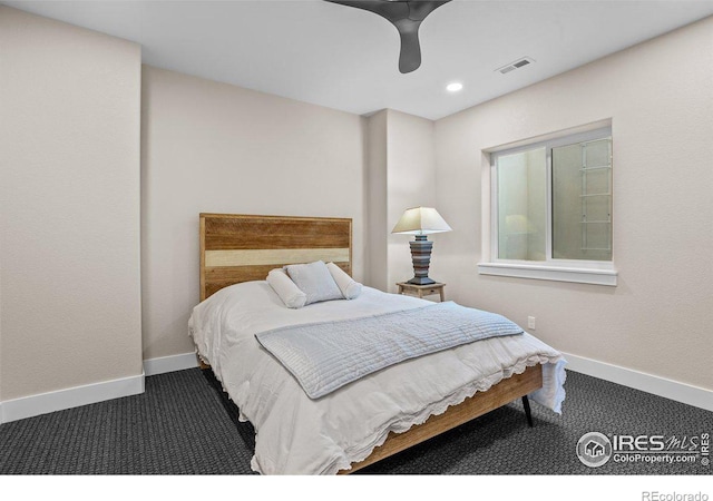 carpeted bedroom featuring ceiling fan