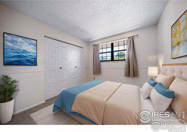 bedroom featuring a closet and a textured ceiling