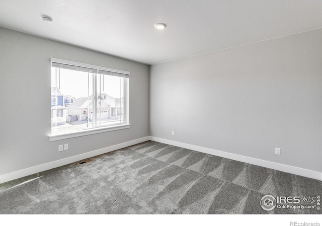 view of carpeted spare room