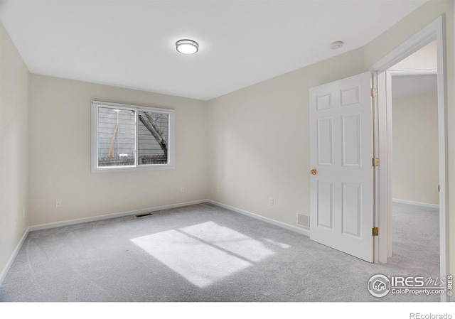 view of carpeted empty room