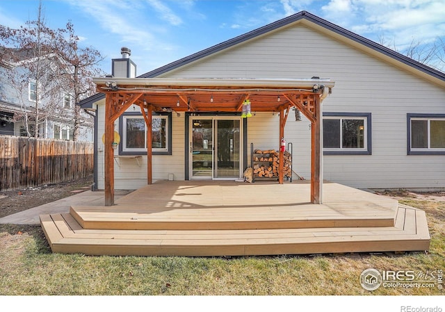 rear view of property with a deck