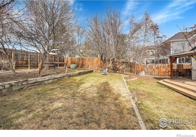 view of yard featuring a deck