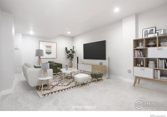 living room featuring baseboards, recessed lighting, and light colored carpet