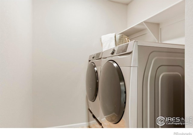 washroom featuring separate washer and dryer