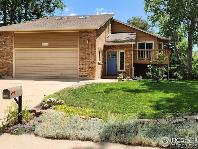 view of front of house featuring a garage, a wooden deck, and a front lawn