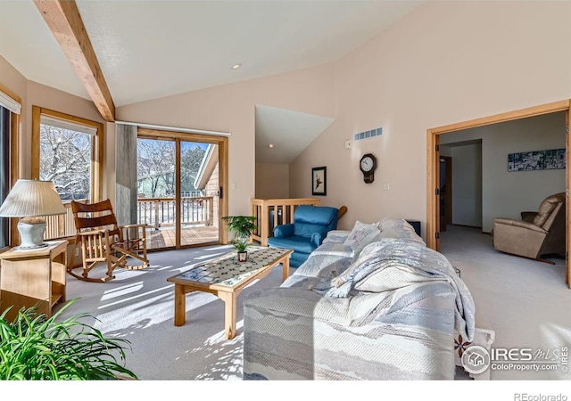 living room featuring high vaulted ceiling, beamed ceiling, and carpet flooring