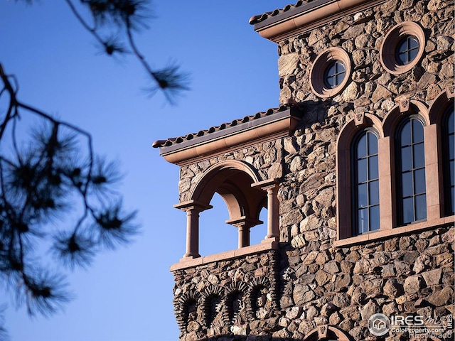 9200 Old Flowers Rd, Bellvue, CO 80512 - exterior view of stone siding and ornate columns