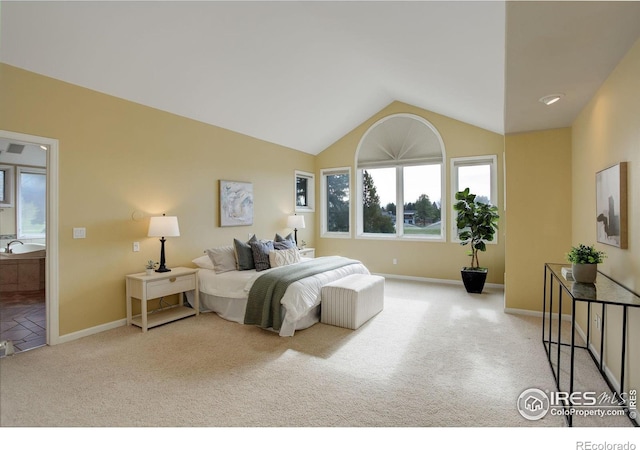 carpeted bedroom featuring vaulted ceiling