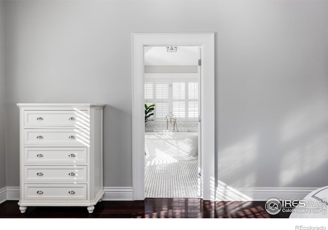 interior details featuring hardwood / wood-style flooring