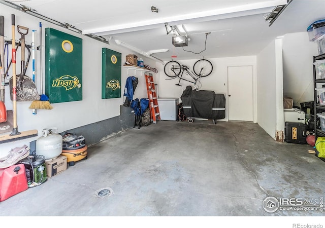 garage featuring a garage door opener