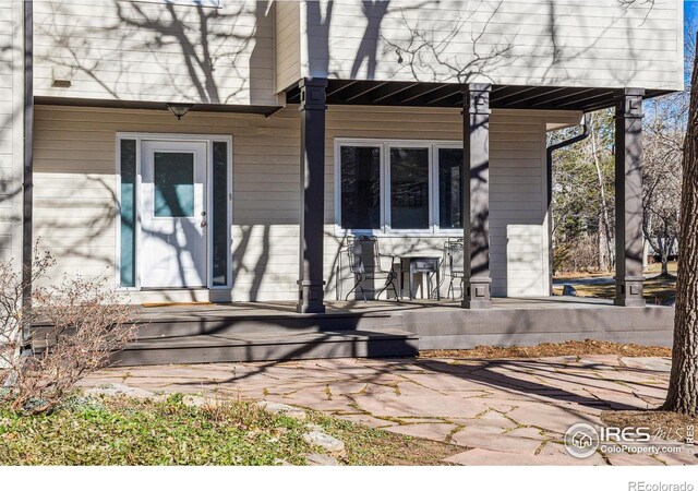 view of home's exterior featuring covered porch