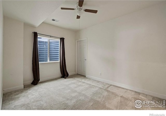 carpeted empty room with ceiling fan